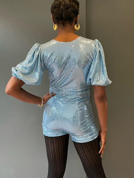 Rear view of the Sophie B Playsuit in light blue