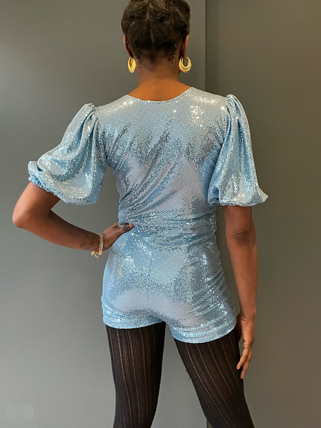 Rear view of the Sophie B Playsuit in light blue