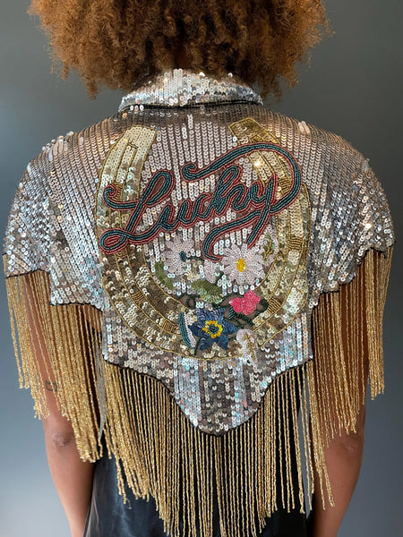 Lucky Silver and Gold sequinned cape with horseshoe detail